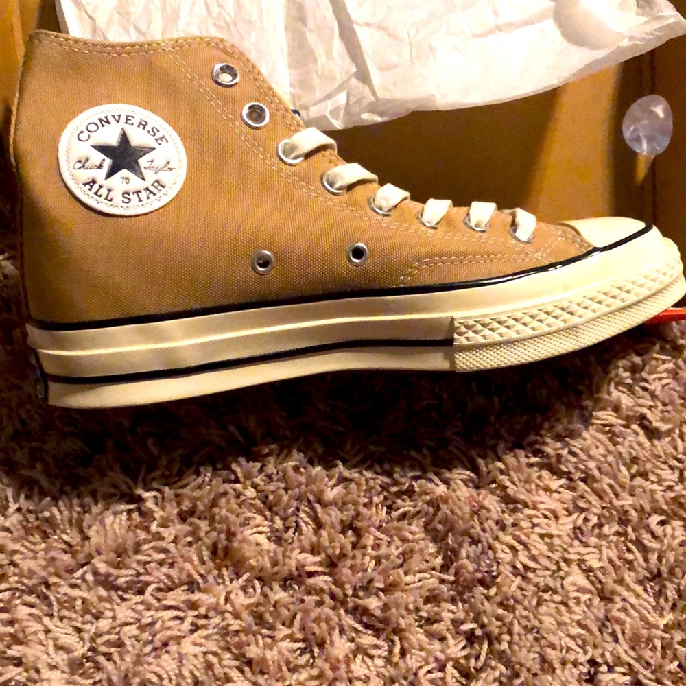 Details of the shoes are in the third photo.